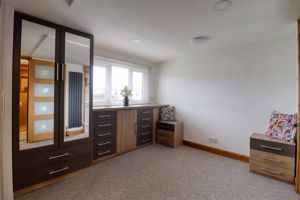 Bedroom One- click for photo gallery